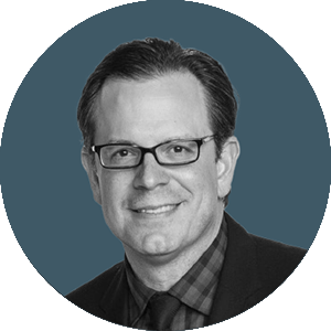 a headshot of Mike Milligan from GCPay